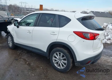 2015 Mazda Cx-5 Touring z USA, uszkodzony, nr VIN JM3KE4CY6F0509478